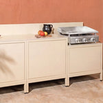 Cozinha exterior Pilotis branco creme com plancha Vivaplancha integrada.
::visuel:creme