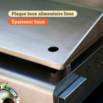 Close-up de uma plancha Vivaplancha mostrando a placa de inox alimentar lisa com 6 mm de espessura, com evacuação integrada na parte frontal.